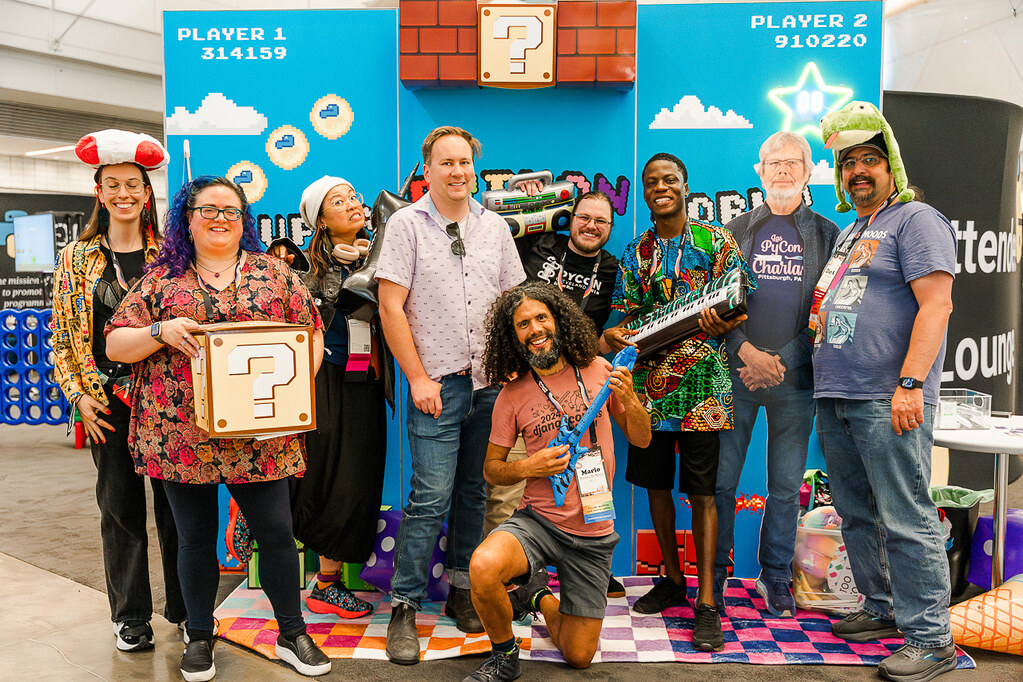 Wonderful people of the Python community, gathered together and smiling for a photo at PyCon US 2025